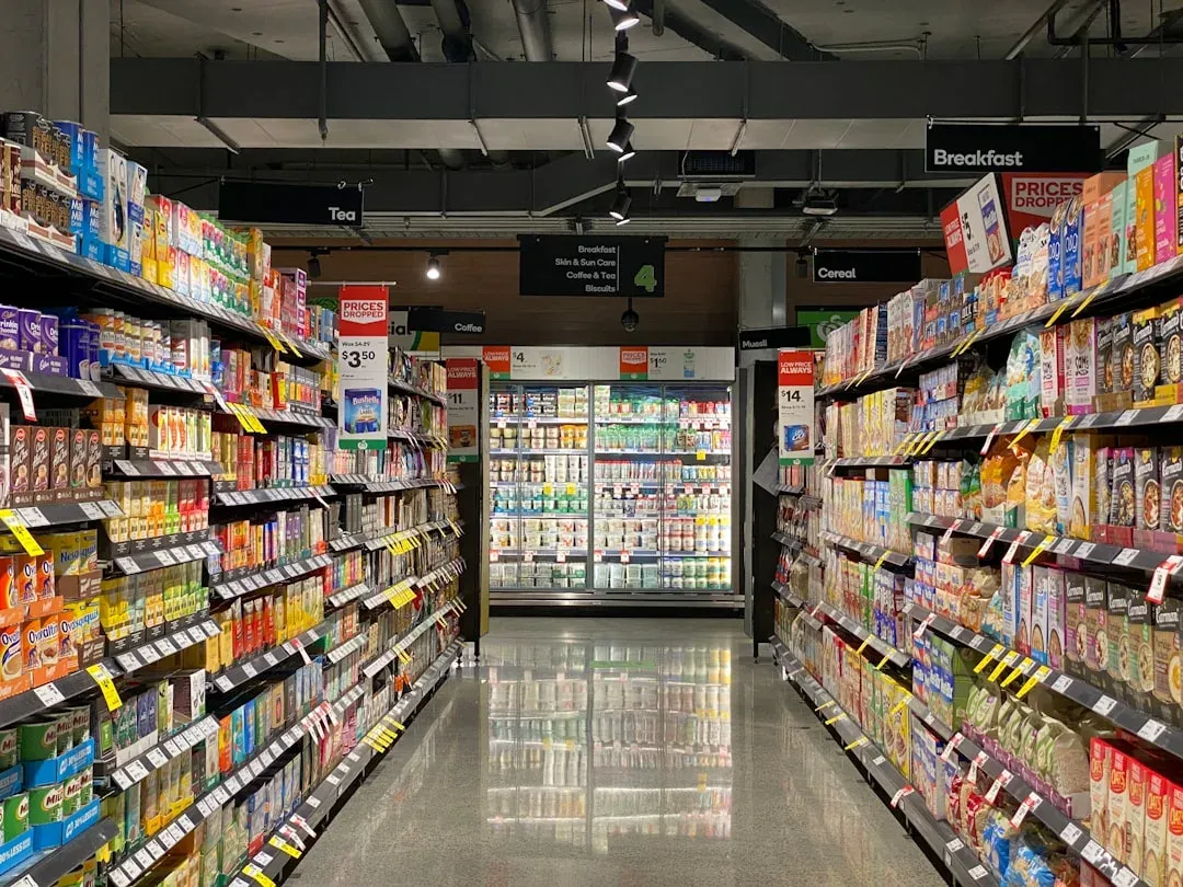 a person shopping for groceries at a zero-waste store